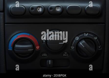 Heating controls set on an old car to full heat. Running hot. It's getting hot in here. Temperature is increasing / climbing. Stock Photo