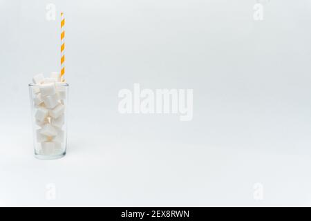 sugar in a glass with a straw cocktail sweets energy Stock Photo