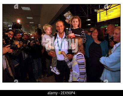 British Olympic Medalists arrive home at Heathrow airport....Steve Redgrave Coxless Four Rowing with family Stock Photo