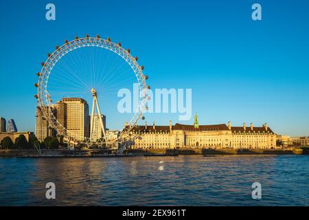 Ferris wheel and thames river in london, uk Stock Photo