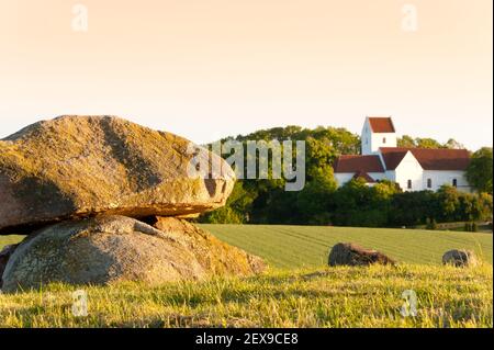 Stone Age Tomb And Medieval Church Stock Photo