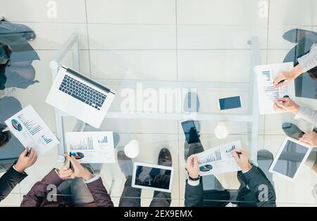 top view. working group analyzing financial data . Stock Photo
