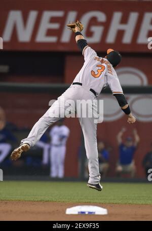 Baltimore Orioles second baseman Ryan Flaherty loses his glove