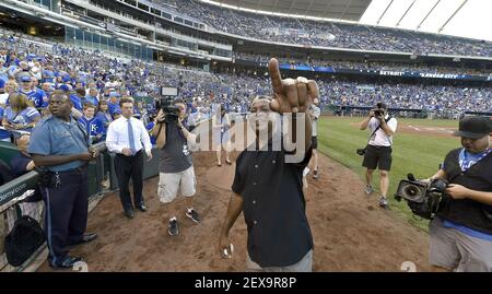 The Kansas City Royals' Franchise Four celebration including a ceremonial  first pitch by, from left, Janie Quisenberry Stone the widow of Dan  Quisenberry, Frank White, Bret Saberhagen and George Brett, before action  against against the Detroit Tigers a