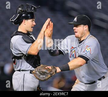 Download JT Realmuto High Five With Teammate Wallpaper