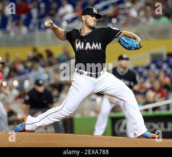 Miami Marlins pitcher Jose Fernandez holds his National League All-Star  jersey before the Marlins' baseball game against the Washington Nationals  on Friday, July 12, 2013, in Miami. (AP Photo/El Nuevo Herald, David