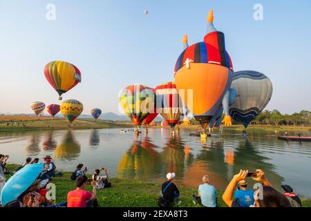 Chiangrai, Thailand - February 15, 2019: Unidentified many people enjoying International Balloon Festival 2019 at Singha park in Chiangrai, Thailand Stock Photo