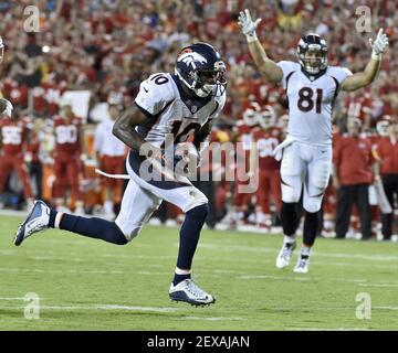 Denver Broncos tight end Owen Daniels and quarterback Peyton Manning  celebrate C.J. Anderson's two yard touchdown against the Carolina Panthers  in the fourth quarter of Super Bowl 50 in Santa Clara, California