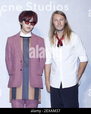 18 September 2015 - Seoul, South Korea : G-Dragon, member of K-Pop boy band  Big Bang, and Swedish Mattias Magnusson, CEO of Acne Studio, at the photo  call for the Swedish multidisciplinary