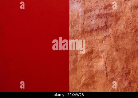 Abstract Grunge Decorative Dark and Light Red Stucco Wall Background. Art Rough Stylized Texture Banner With Copy Space. Stock Photo