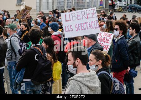 Lyon (France), March 04, 2021. Gathering of the world of culture in front of the Halle Tony Garnier. Demonstrators with a sign: free the shows. Stock Photo