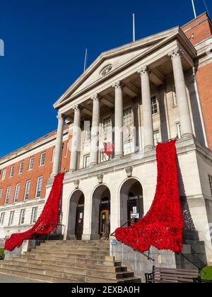 Chesterfield Town Hall Derbyshire England UK draped in red poppies for Remembrance Day. Stock Photo