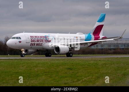 London Southend Airport, Essex, UK. 4th Mar, 2021. German airline Eurowings has added a message onto one of their airliners to thank their employees for their efforts during the COVID 19 pandemic. One side has ‘Fuelled by the world’s greatest team’ in English, and in German on the other. The Airbus A320 was flown to Satys Air Livery at Southend for the work and has today departed to go into service. Eurowings CEO Jens Bischof: 'Our employees have shown exceptional team spirit during the crisis. That is why we want to say thank you in an extraordinary way' Stock Photo