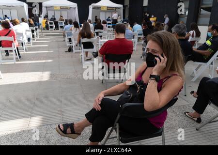 Santiago, Metropolitana, Chile. 4th Mar, 2021. A woman accompanies her mother to receive her second dose of the Sinovac vaccine against the coronavirus, at a vaccination center in Santiago. Credit: Matias Basualdo/ZUMA Wire/Alamy Live News Stock Photo