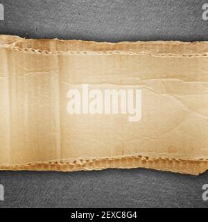 Riped grunge cardboard background Stock Photo