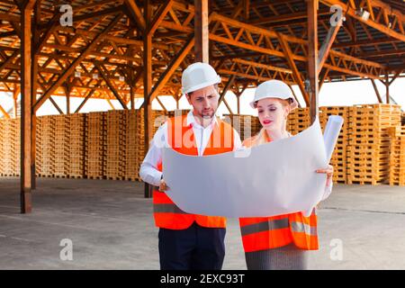 Team of young engineer and architects discussing new plan Stock Photo