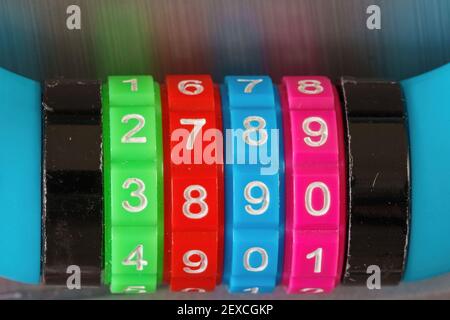 Close up of a colorful combination lock and their numbers Stock Photo