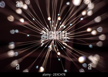 An abstract wire mesh with small lamps and heart bokeh Stock Photo