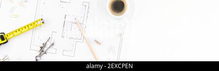 Creative flat lay overhead top view blueprint flat project plan hot coffee cup and office supplies on decorator table workspace swatches tools and equ Stock Photo
