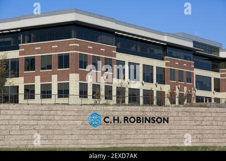 A logo sign outside of the headquarters of C.H. Robinson in Eden ...