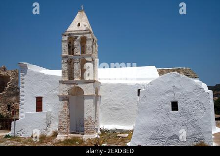 Greece, Kythira island. Church, hora, by the historic castle. Traditional old chapel with dramatic bell tower.  Clear blue sky provides copy space. Stock Photo