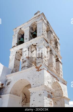 Greece, Kythira island. Church, hora, by the historic castle. Traditional old chapel with dramatic bell tower.  Clear blue sky provides copy space. Stock Photo