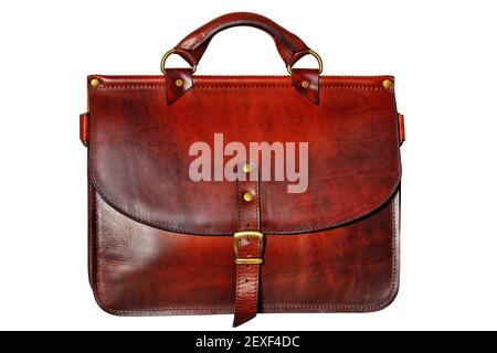 Business stylish strict leather briefcase in red-brown color with a belt buckle in the middle in vintage style isolated on white background. Stock Photo