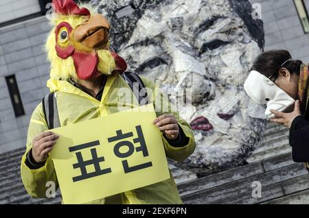 December 5th 2015 - Seoul, South Korea - South Korean artists protest against conservative President Park Geun-hye, who had compared masked protesters to terrorists after clashes with police broke out at a rally last month. Photo by Kish Kim *** Please Use Credit from Credit Field *** *** Please Use Credit from Credit Field ***