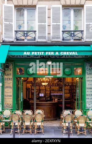 Open front doors at Cafe Au Petit Fer A Cheval in the Marais, Paris, Ile-de-France, France Stock Photo