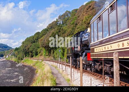 England, Devon, GWR Steam Locomotive No. 7827 'Lydham Manor' departing from Kingswear on the Dartmouth Steam Railway Stock Photo
