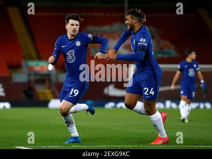 Chelsea's Mason Mount (left) celebrates scoring their side's first goal of the game during the Premier League match at Anfield, Liverpool. Picture date: Thursday March 4, 2021. Stock Photo