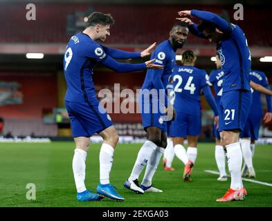 Chelsea's Mason Mount (left) celebrates scoring their side's first goal of the game during the Premier League match at Anfield, Liverpool. Picture date: Thursday March 4, 2021. Stock Photo