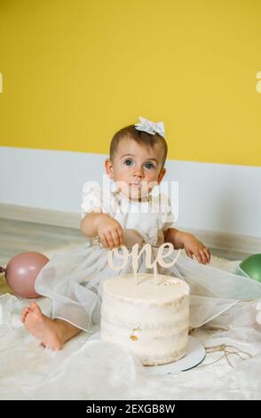 Eco Friendly Baby First Birthday Party with cake. 1st Birthday ideas with natural decoration. Sustainable eco-friendly birthday alternatives party for Stock Photo