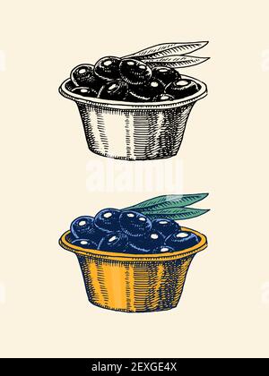 Olives in a bowl and olive branch isolated on a white background ...