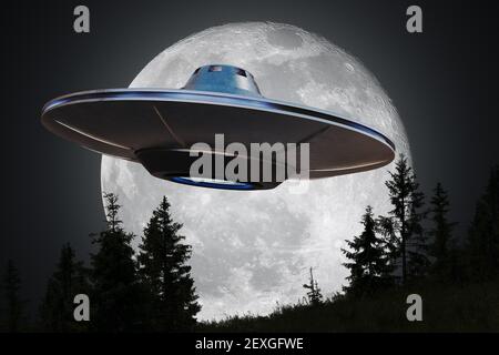 Alien spaceship (UFO) is flying at night. Moon in background. Stock Photo