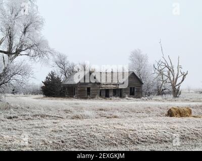 Old Abandoned Homestead in the Dead of Winter Stock Photo
