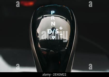 Gear Shift Selector macro photo close up. Gear lever close up. Modern Automatic Transmission in Car. Stock Photo