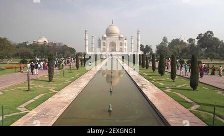 AGRA, INDIA - MARCH, 26, 2019: the taj mahal and fountain as viewed from the main entrance in agra, india on a spring morning Stock Photo