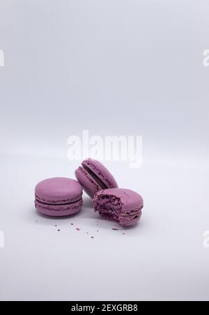Delicious sweet macaroons on white background. French dessert Stock Photo