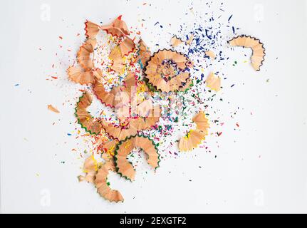 Coloured pencil shavings on the white background Stock Photo