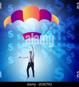 The businessman in golden parachute concept Stock Photo