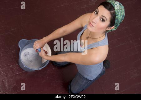 Housekeeper Does Floors Stock Photo