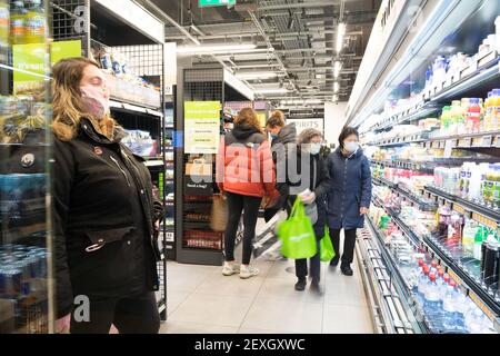 shoppers in face mask visit Amazon fresh ,   its first store with 'Just walk out' at Ealing London, UK Stock Photo