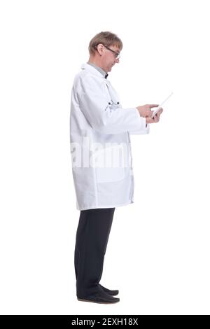attending doctor using a digital tablet.isolated on a white background. Stock Photo