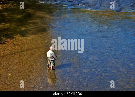 Unrecognizable old man fishing in the little river Gatlinburg Tennessee Stock Photo