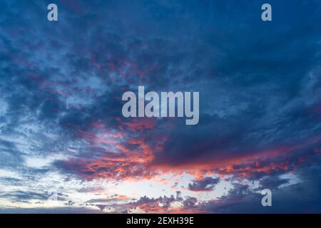 Stock photo of amazing sunset in cloudy sky Stock Photo - Alamy