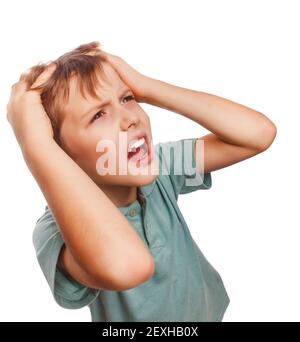 Child upset boy angry shout produces evil face portrait isolated Stock Photo