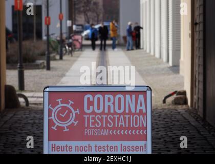 Potsdam, Germany. 03rd Mar, 2021. A sign 'Corona Test Station Potsdam. Get tested today' is located at the gateway to the test center in the Kutschstallhof Am Neuen Markt. Residents of the state capital have been able to get tested for Corona (rapid antigen test) free of charge since 01.03.2021. The offer is part of the strategy 'Open, but safe'. Credit: Soeren Stache/dpa-Zentralbild/ZB/dpa/Alamy Live News Stock Photo