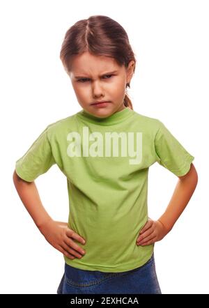 Angry evil girl shows fists experiencing anger and isolated on w Stock Photo