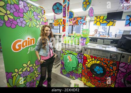 Latin female singer Leslie Grace appears at the Happy Family Laundromat in the Bronx borough of New York on Friday, May 16, 2014 at a promotional event for Procter & Gamble's Gain 'Flings' detergent pods. Activist investor Trian Fund Management LP has taken a $3.5 billion stake in the Procter & Gamble Co. Trian will attempt to increase sales and sell brands that are unprofitable. (Photo by Richard B. Levine) *** Please Use Credit from Credit Field ***